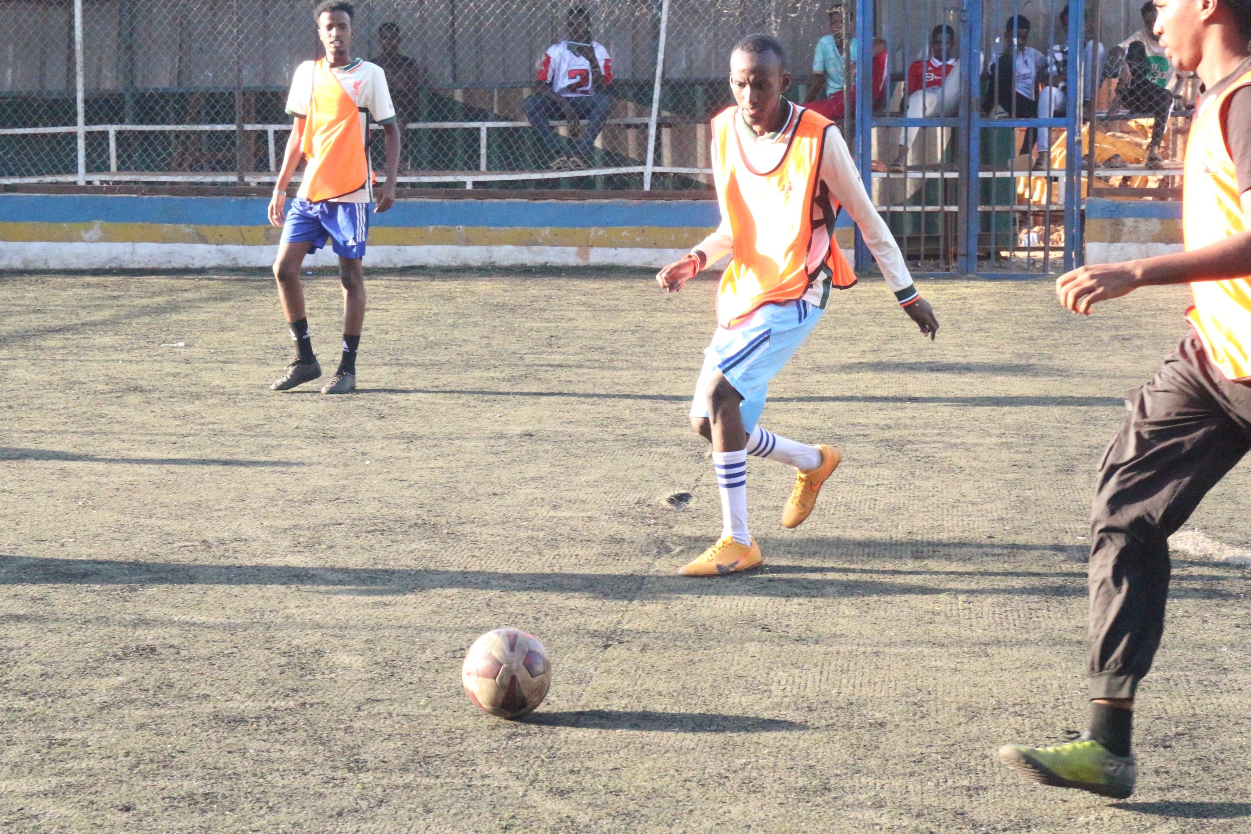 A futsal match on the community pitch